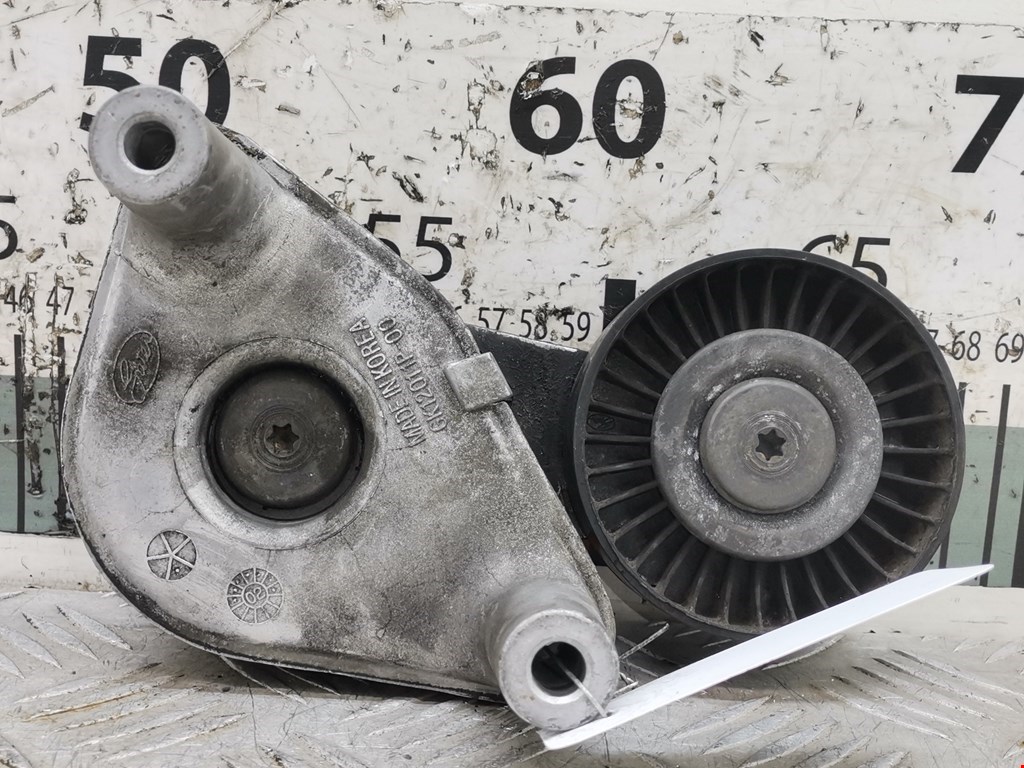 Натяжитель ремня генератора (приводного поликлинового ремня Hyundai Coupe 2 (2002-2009)