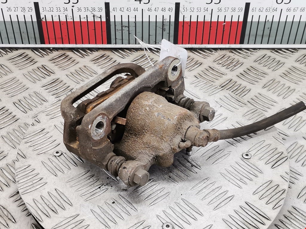 Суппорт задний левый NISSAN X-Trail T30 2000-2007