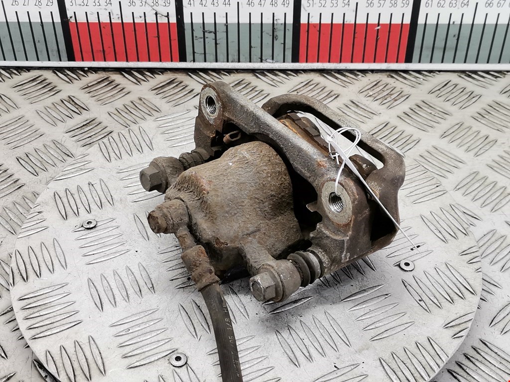 Суппорт задний левый NISSAN X-Trail T30 2000-2007