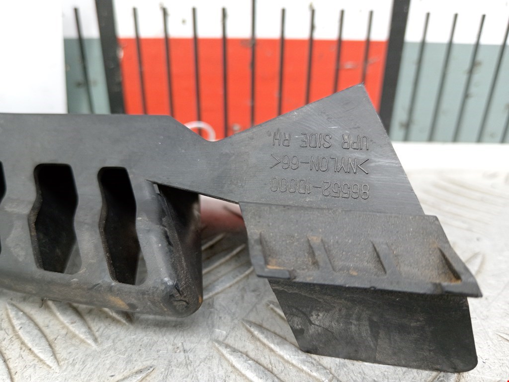 Кронштейн фары правый KIA Carens 2006-2012