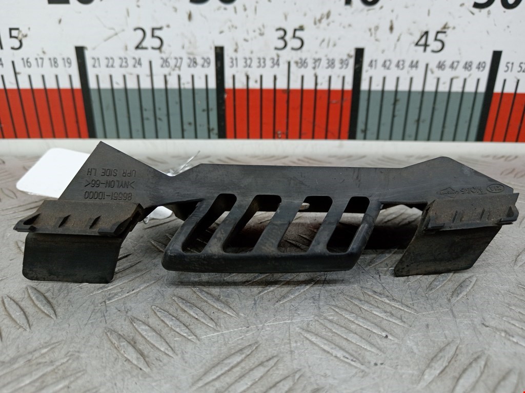 Кронштейн фары левый KIA Carens 2006-2012