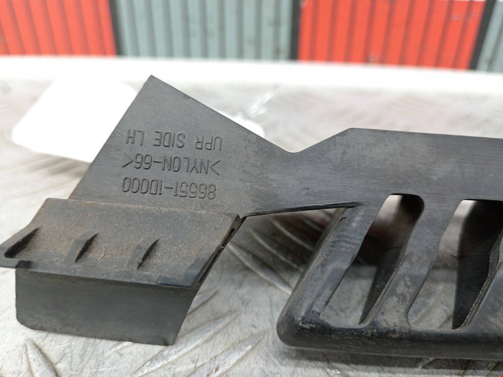 Кронштейн фары левый KIA Carens 2006-2012