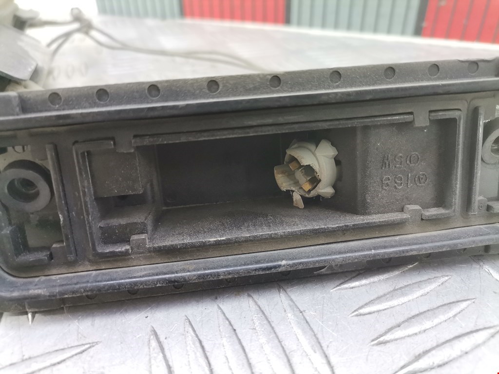 Фонарь подсветки номера MAZDA Millenia 1995-2002