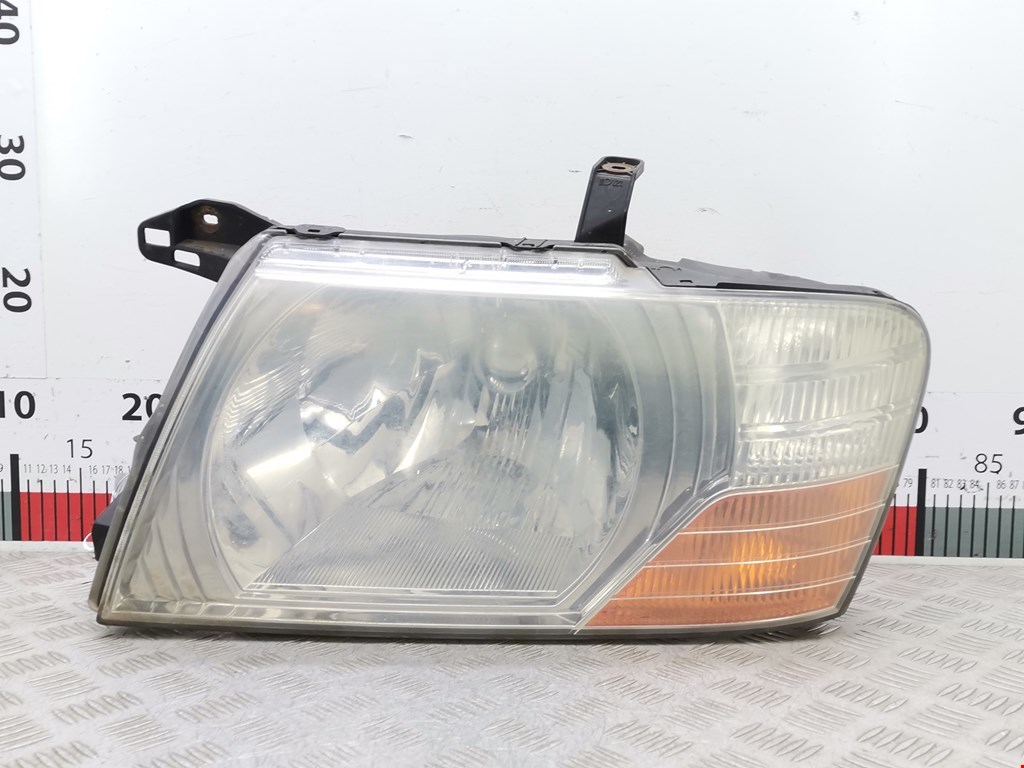 Фара левая MITSUBISHI Pajero III 2000-2006