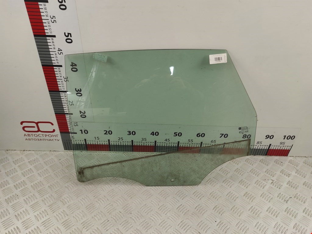Стекло двери заднее левое OPEL Astra J 2009-2017