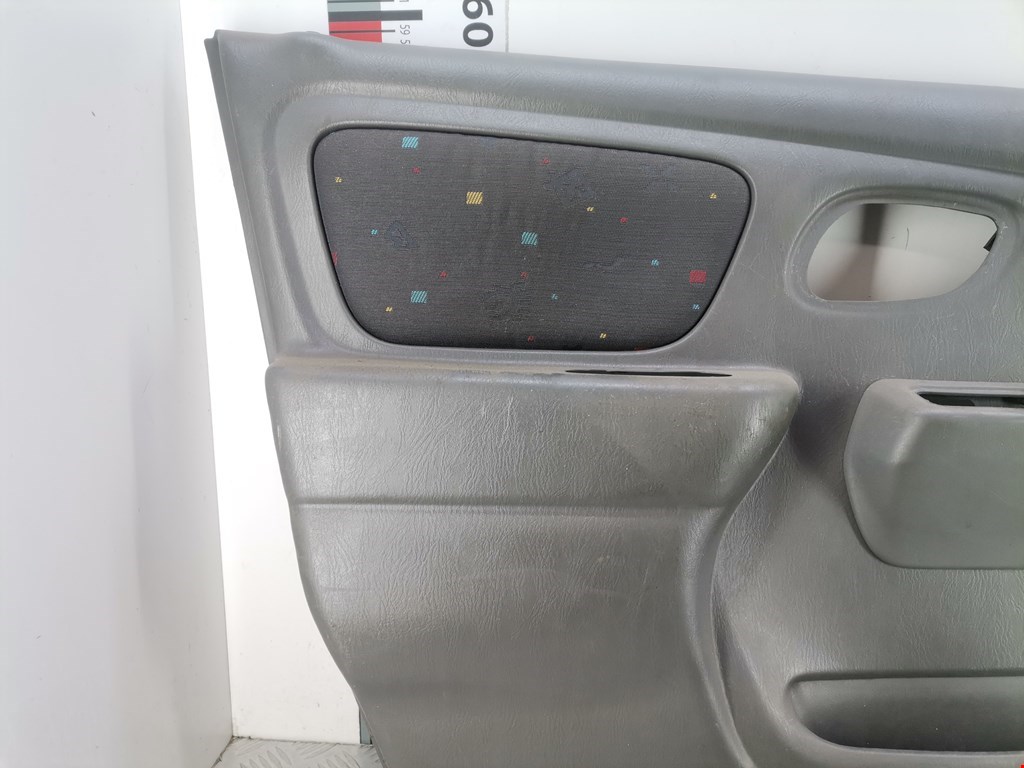 Обшивка двери передняя левая SUZUKI Alto HA12 1998-2004