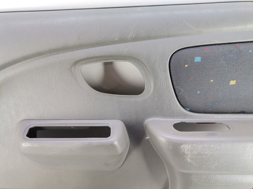 Обшивка двери передняя правая SUZUKI Alto HA12 1998-2004