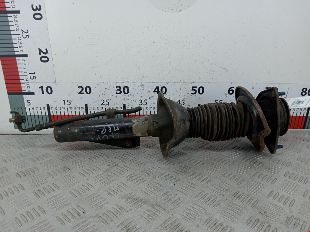 Амортизатор передний левый FORD Escort 1995-2000