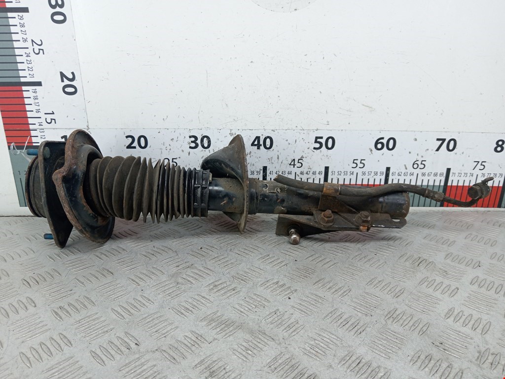 Амортизатор передний левый FORD Escort 1995-2000