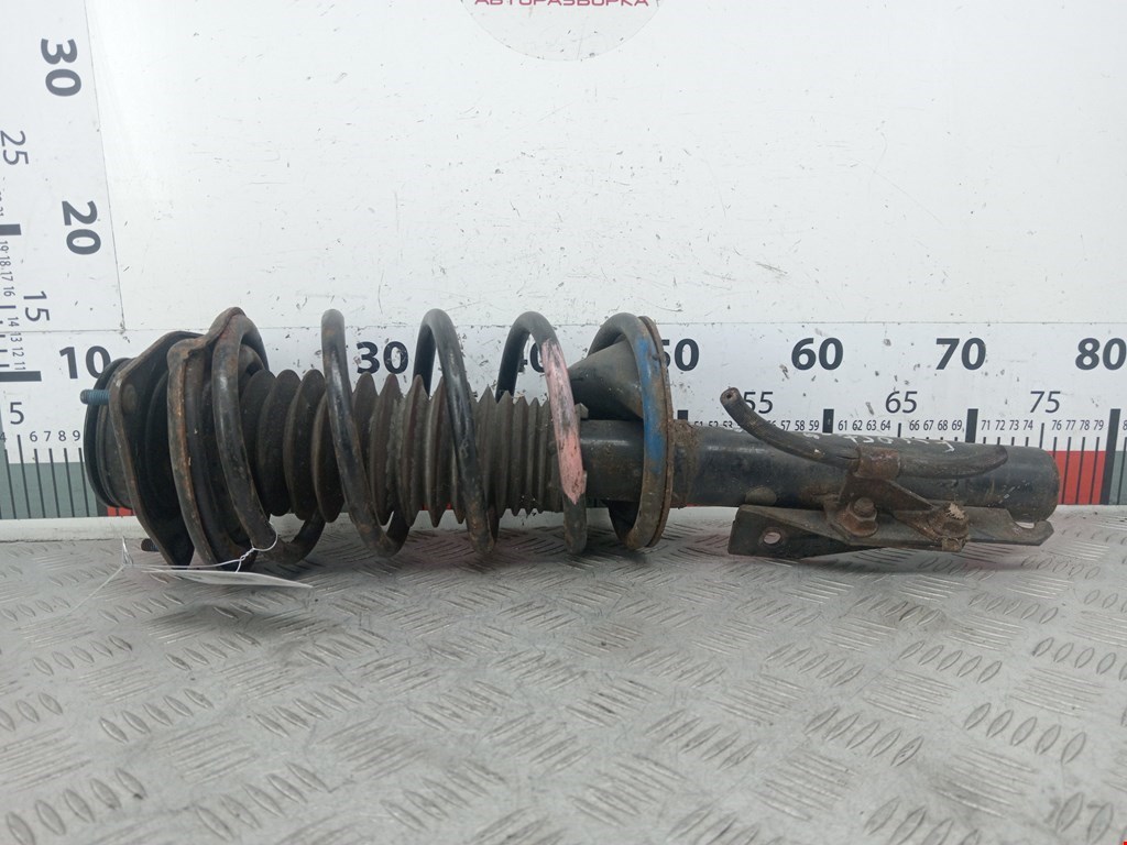 Амортизатор передний левый FORD Escort 1995-2000