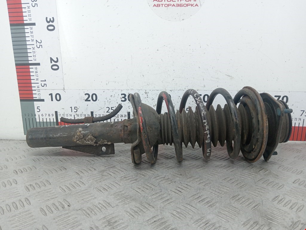 Амортизатор передний левый FORD Escort 1995-2000