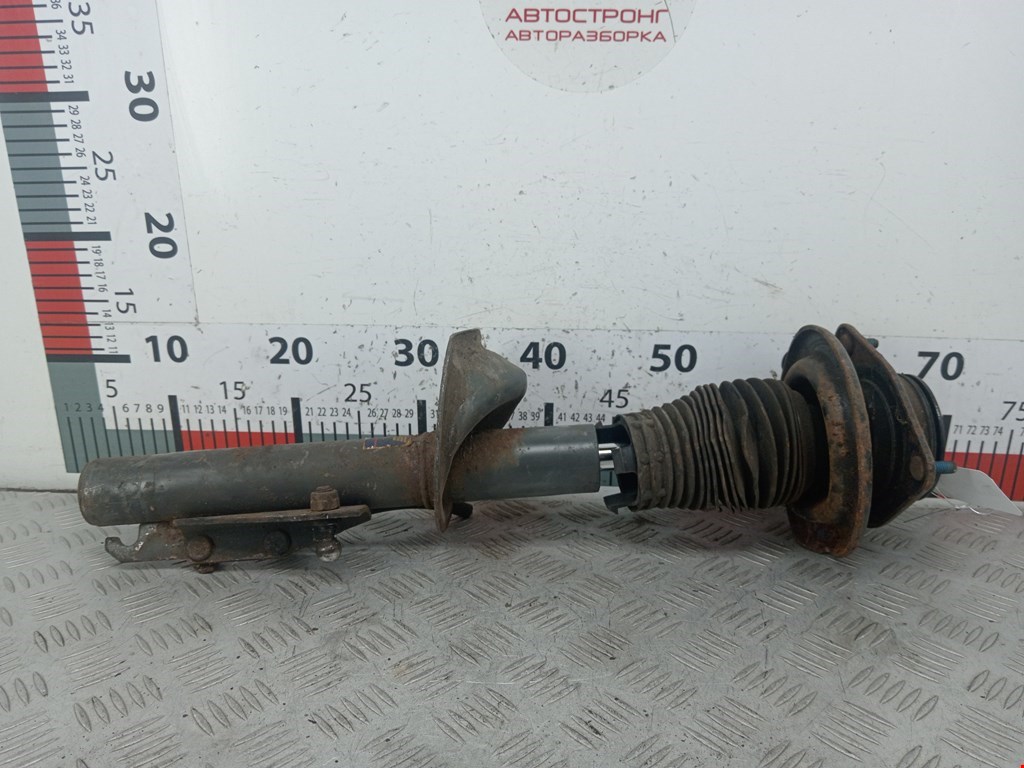 Амортизатор передний левый FORD Escort 1995-2000