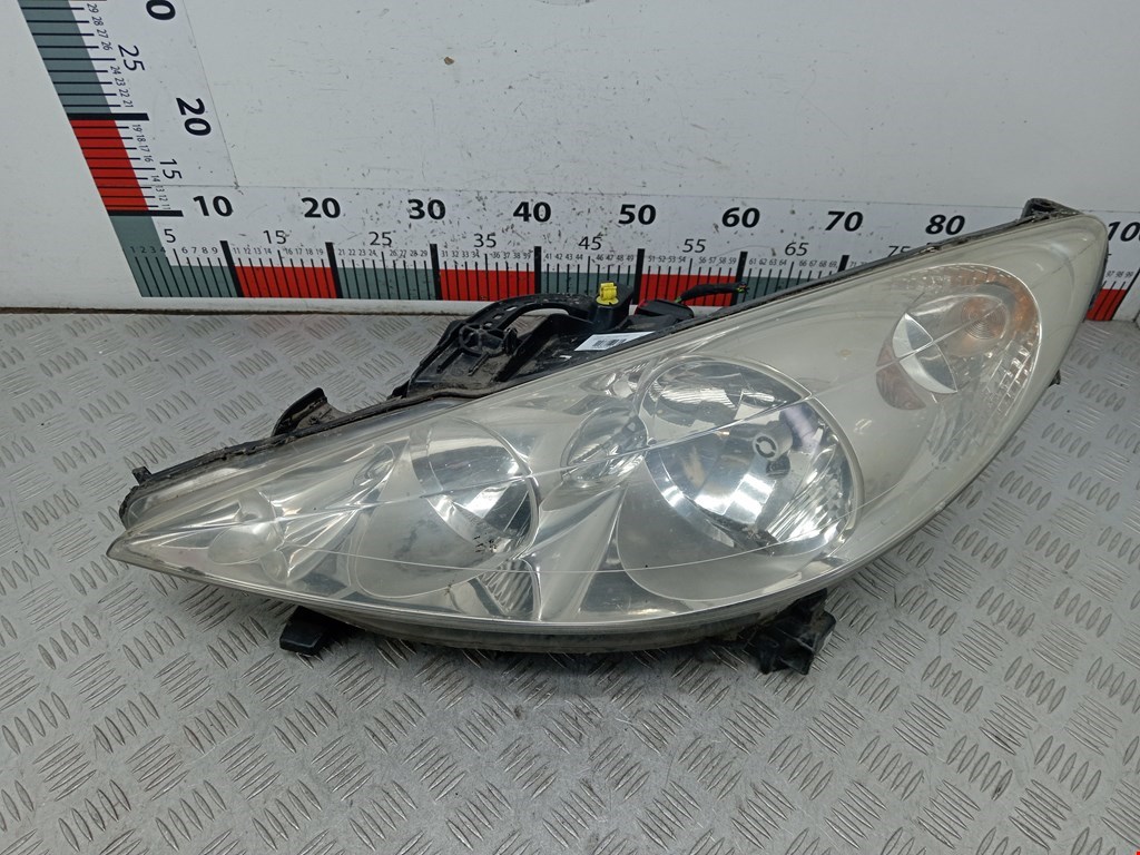 Фара левая PEUGEOT 207 2006-2015