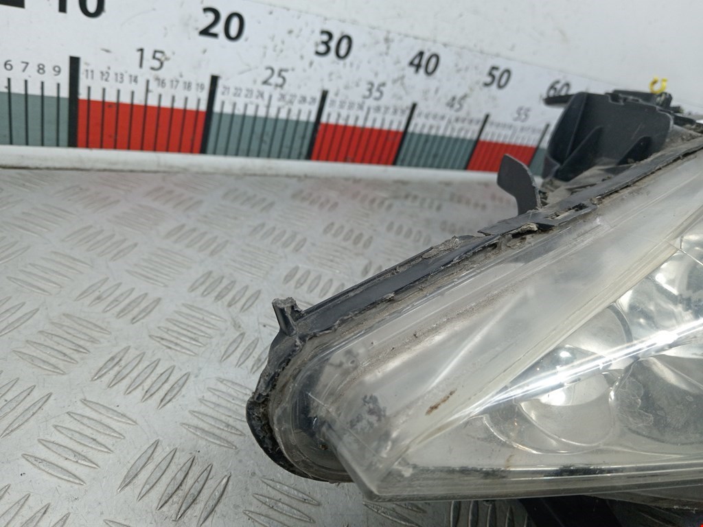 Фара левая PEUGEOT 207 2006-2015