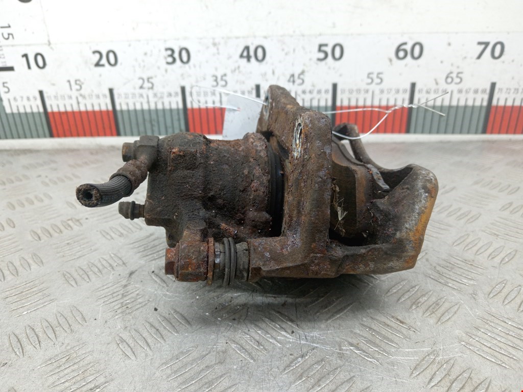 Суппорт передний левый OPEL Tigra B 2004-2009