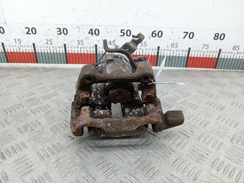 Суппорт задний левый VOLKSWAGEN Caddy III 2004-2015