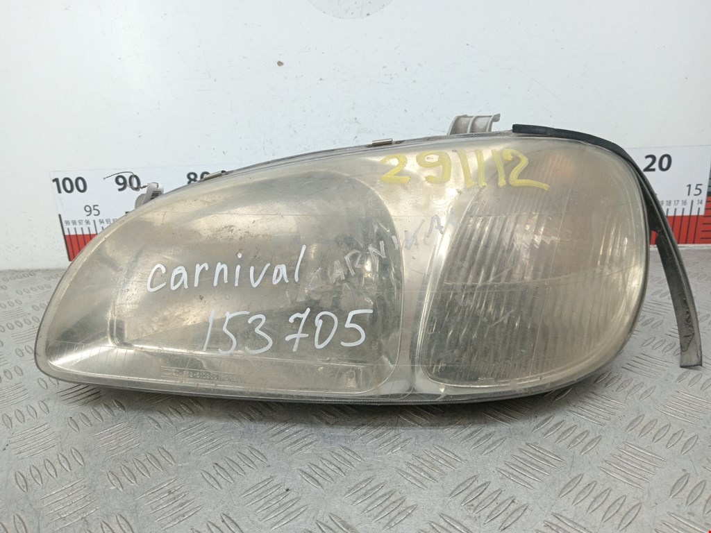 Фара левая KIA Carnival I 1999-2005