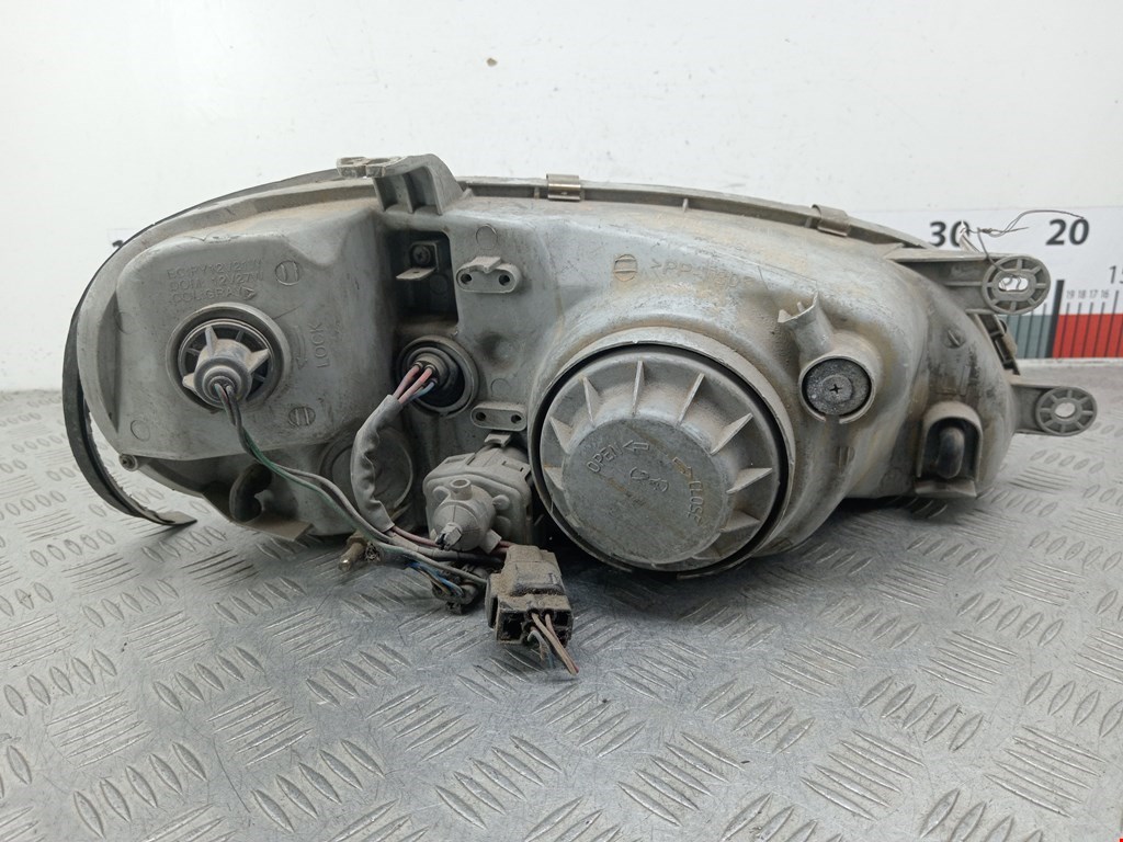 Фара левая KIA Carnival I 1999-2005