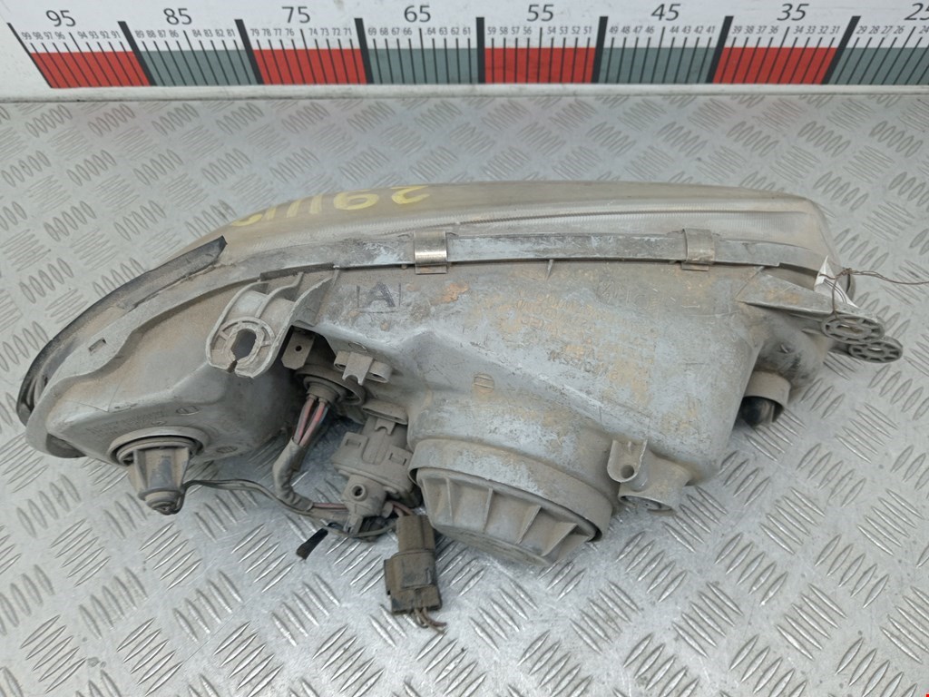 Фара левая KIA Carnival I 1999-2005