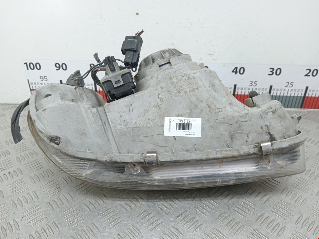 Фара левая KIA Carnival I 1999-2005