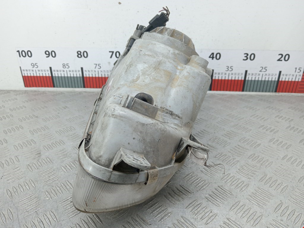 Фара левая KIA Carnival I 1999-2005