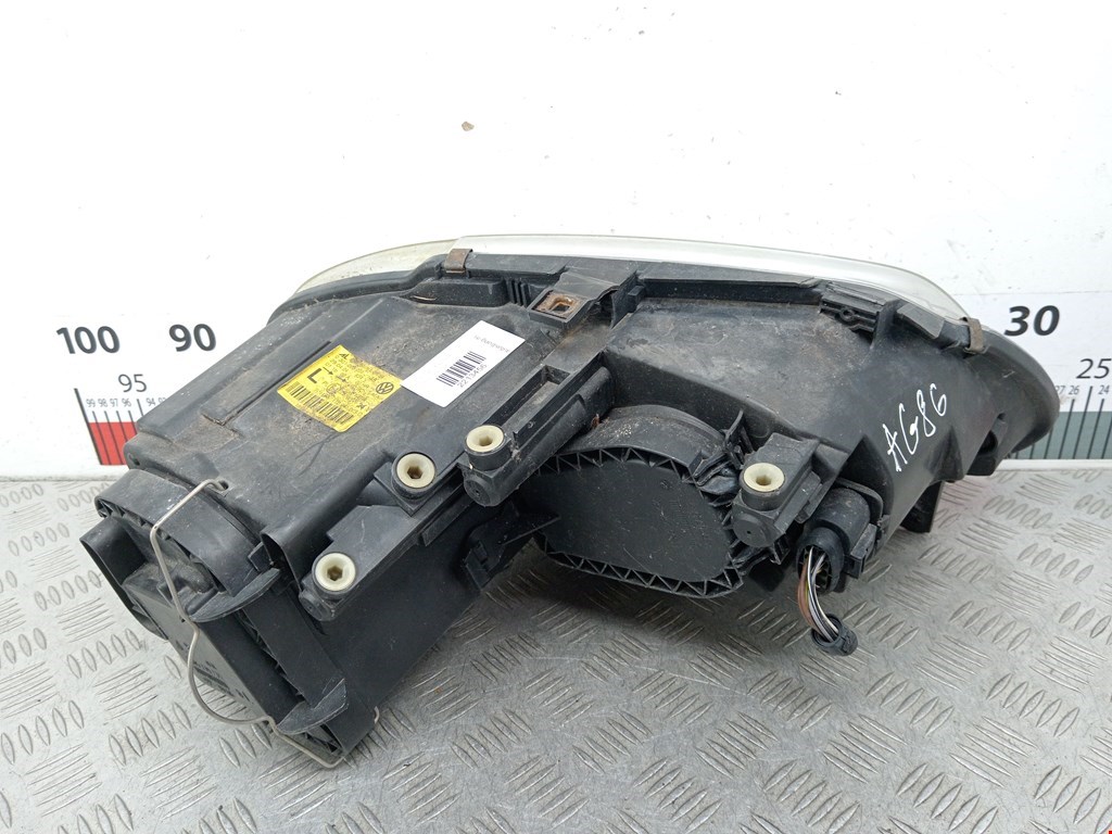Фара левая VOLKSWAGEN Touran 2003-2010
