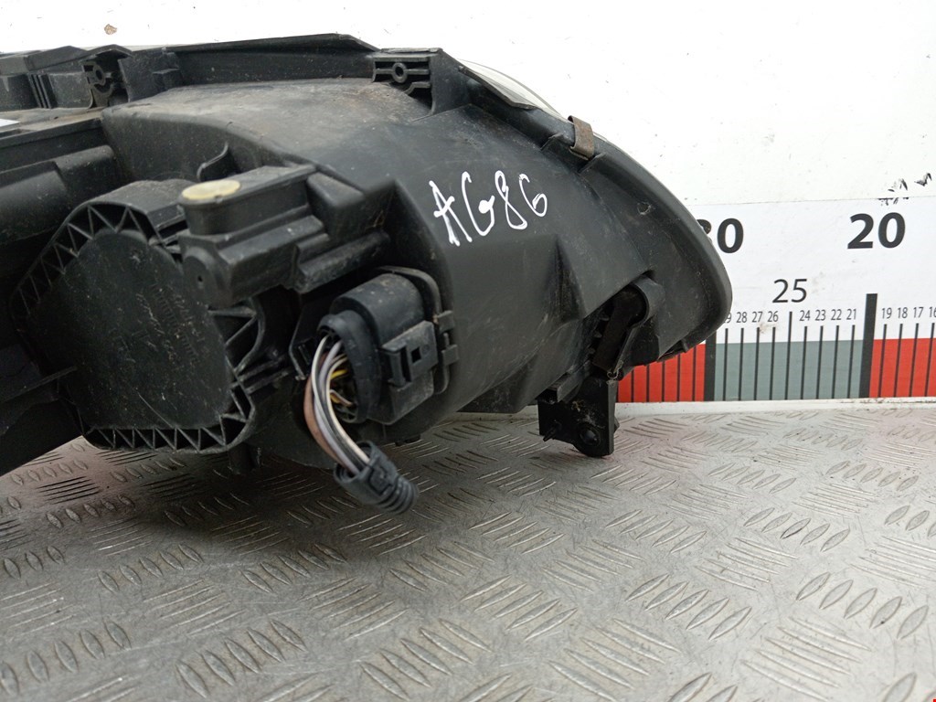 Фара левая VOLKSWAGEN Touran 2003-2010