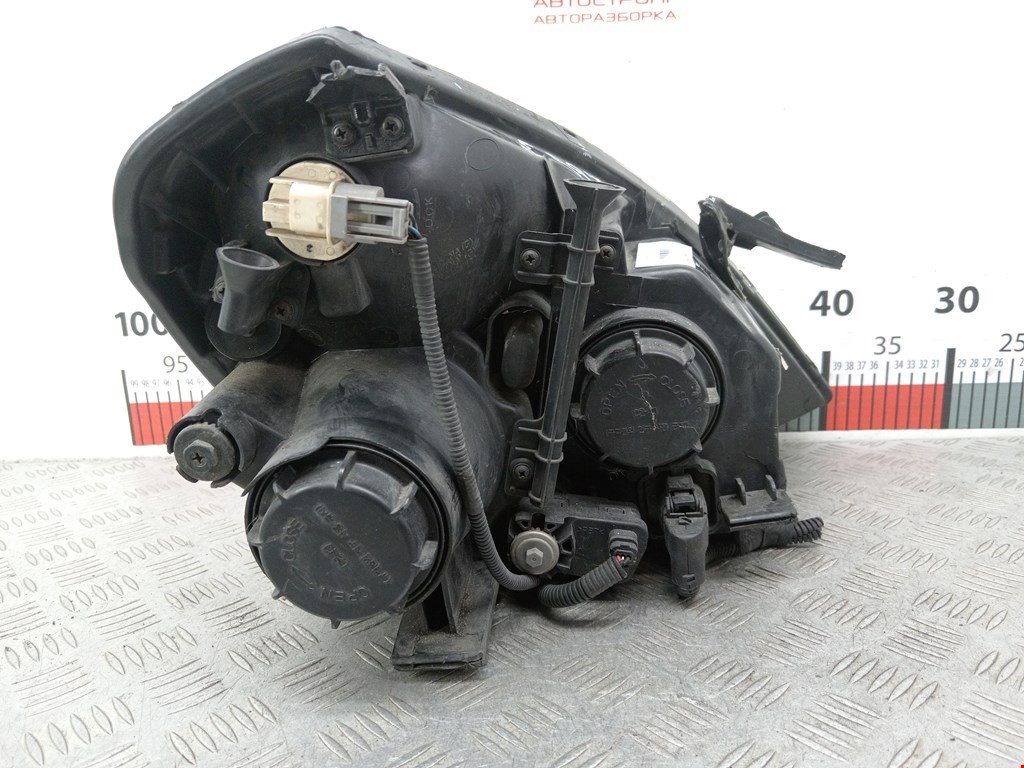 Фара левая KIA Carnival II 2006-2014