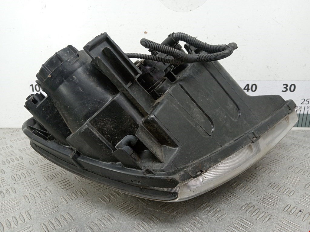 Фара левая KIA Carnival II 2006-2014