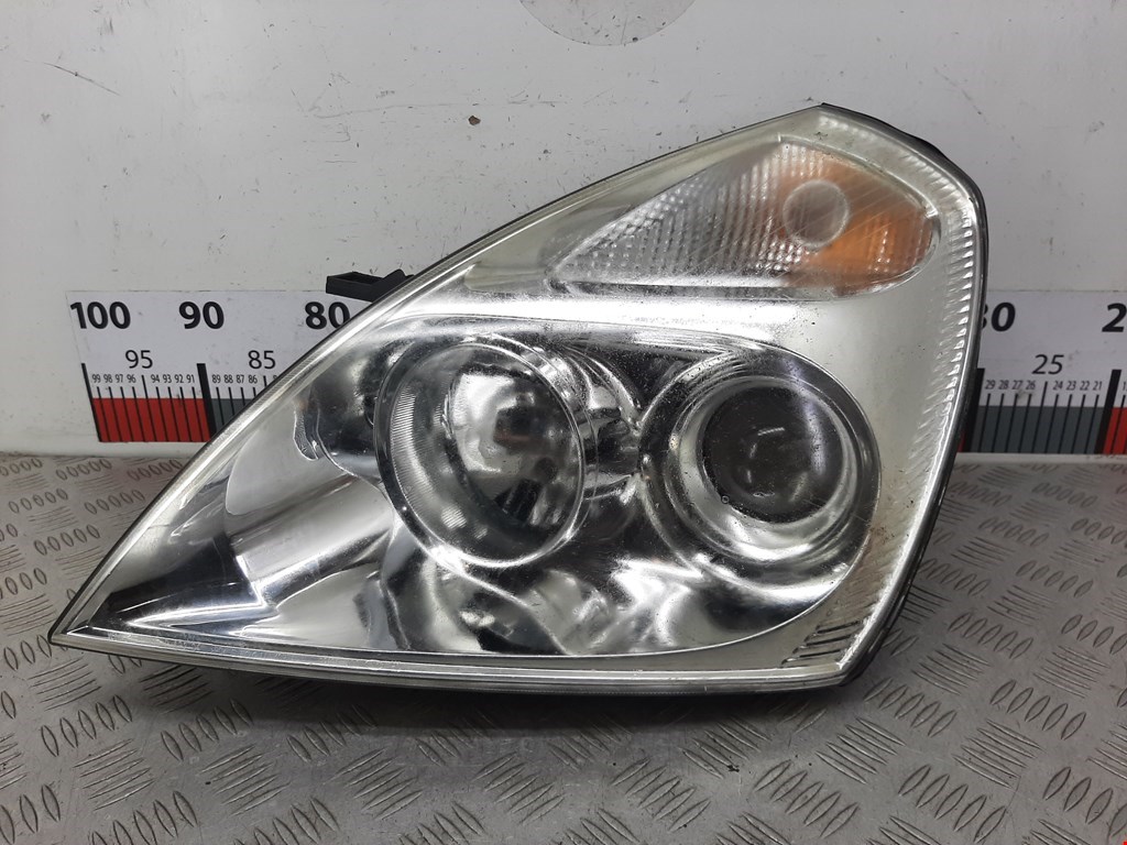 Фара левая KIA Carnival II 2006-2014