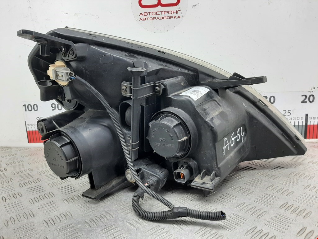 Фара левая KIA Carnival II 2006-2014