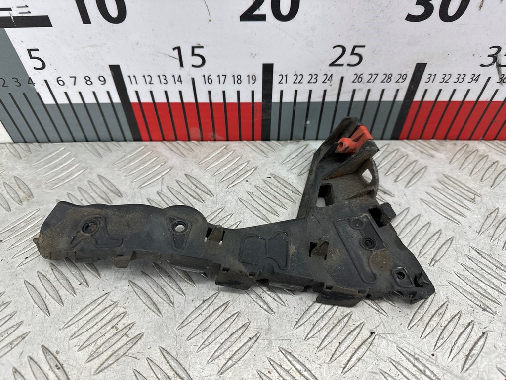 Кронштейн (крепление) переднего бампера правый Opel Astra H (2004-2014)