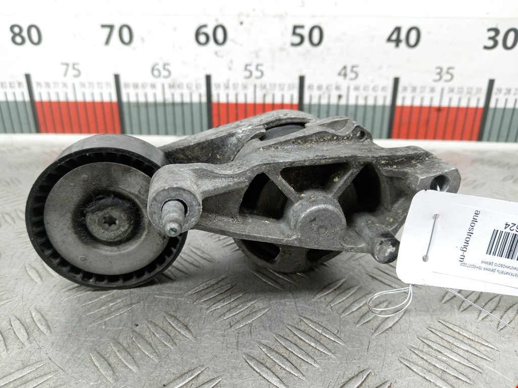 Натяжитель ремня генератора (приводного поликлинового ремня Volkswagen Golf 5 (2003-2008)