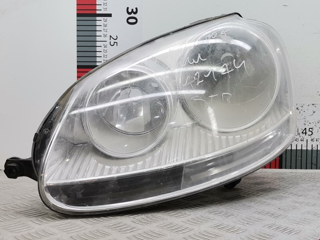 Фара левая VOLKSWAGEN Golf V 2003-2009