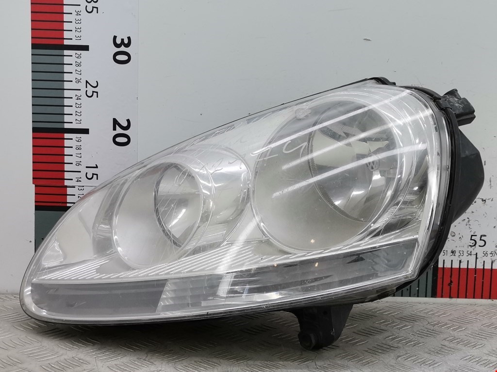 Фара левая VOLKSWAGEN Golf V 2003-2009
