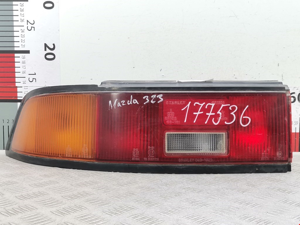 Фонарь задний левый MAZDA 323 BA 1994-1998
