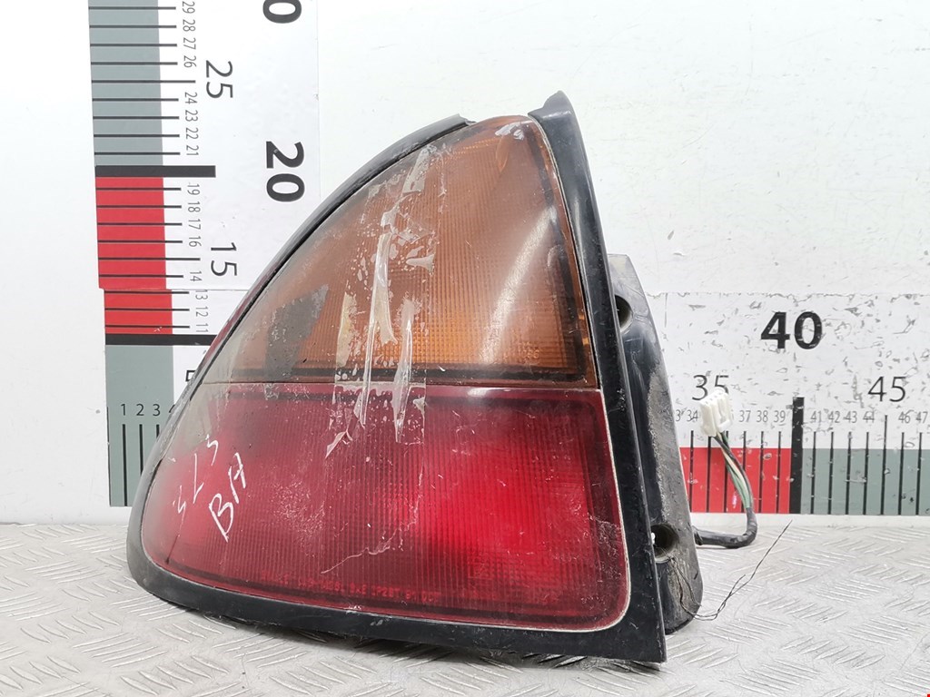Фонарь задний левый MAZDA 323 BA 1994-1998
