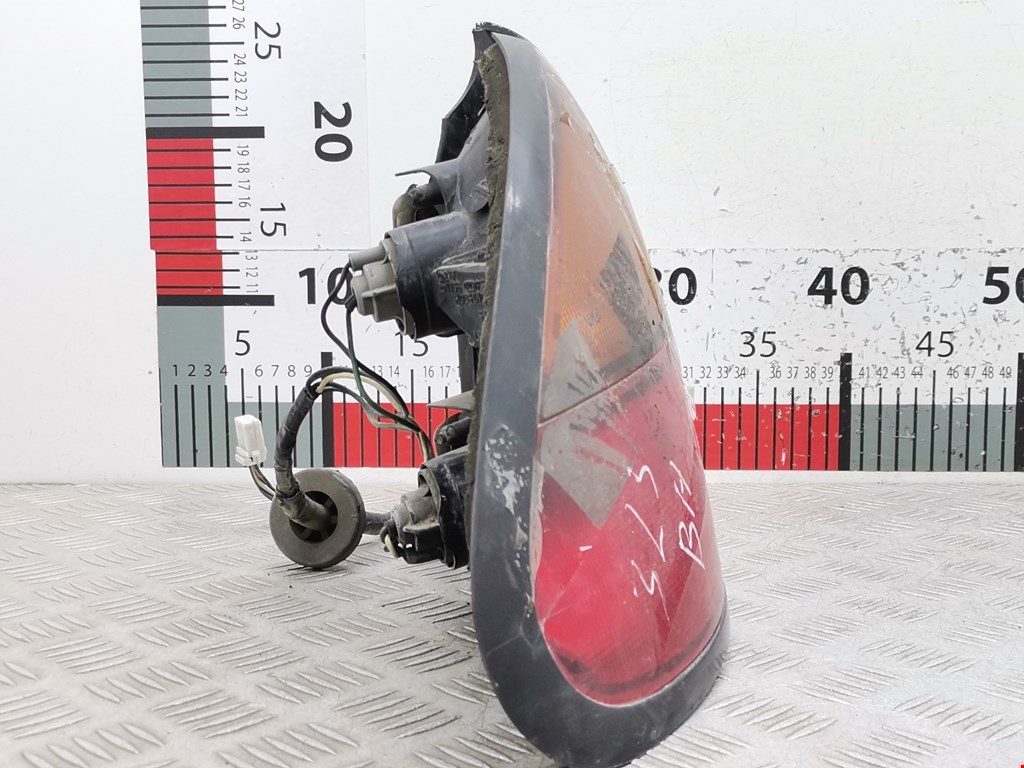 Фонарь задний левый MAZDA 323 BA 1994-1998