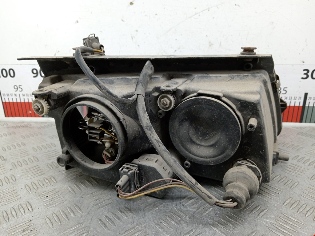 Фара левая VOLKSWAGEN Passat B5 1997-2005