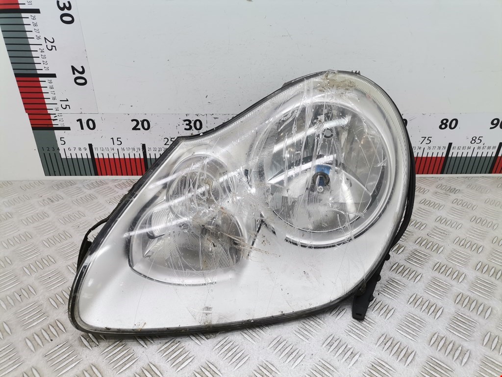 Фара левая PORSCHE Cayenne 955/957 2002-2010