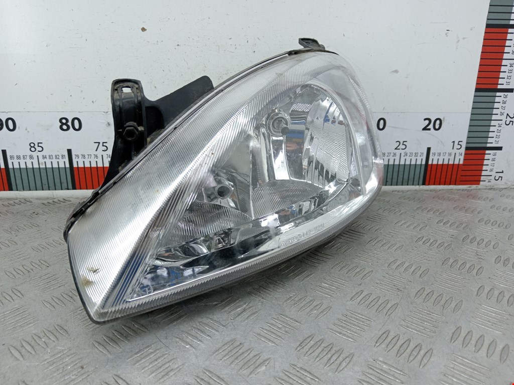 Фара левая OPEL Combo C 2001-2011