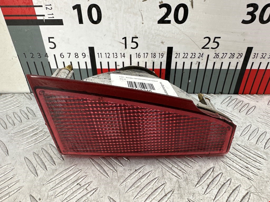 Фонарь противотуманный правый Nissan Primera P12 (2001-2008)