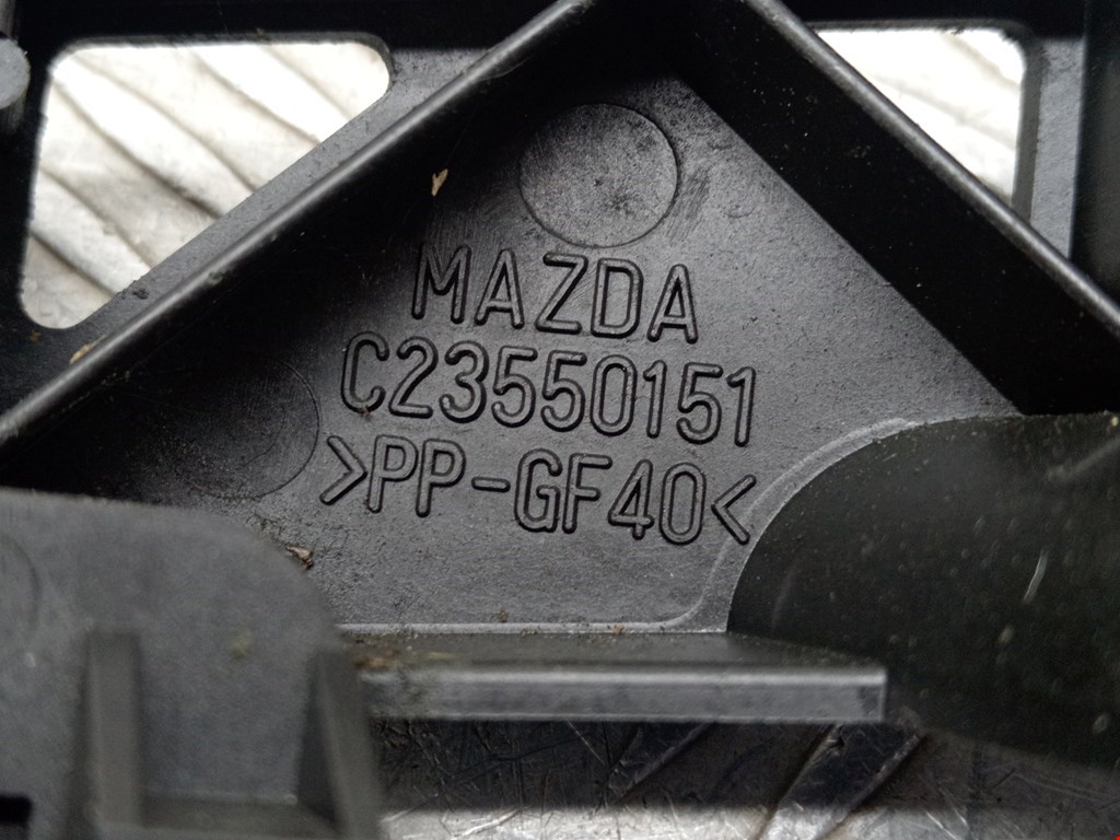 Кронштейн фары правый MAZDA Mazda 5 CR 2005-2010