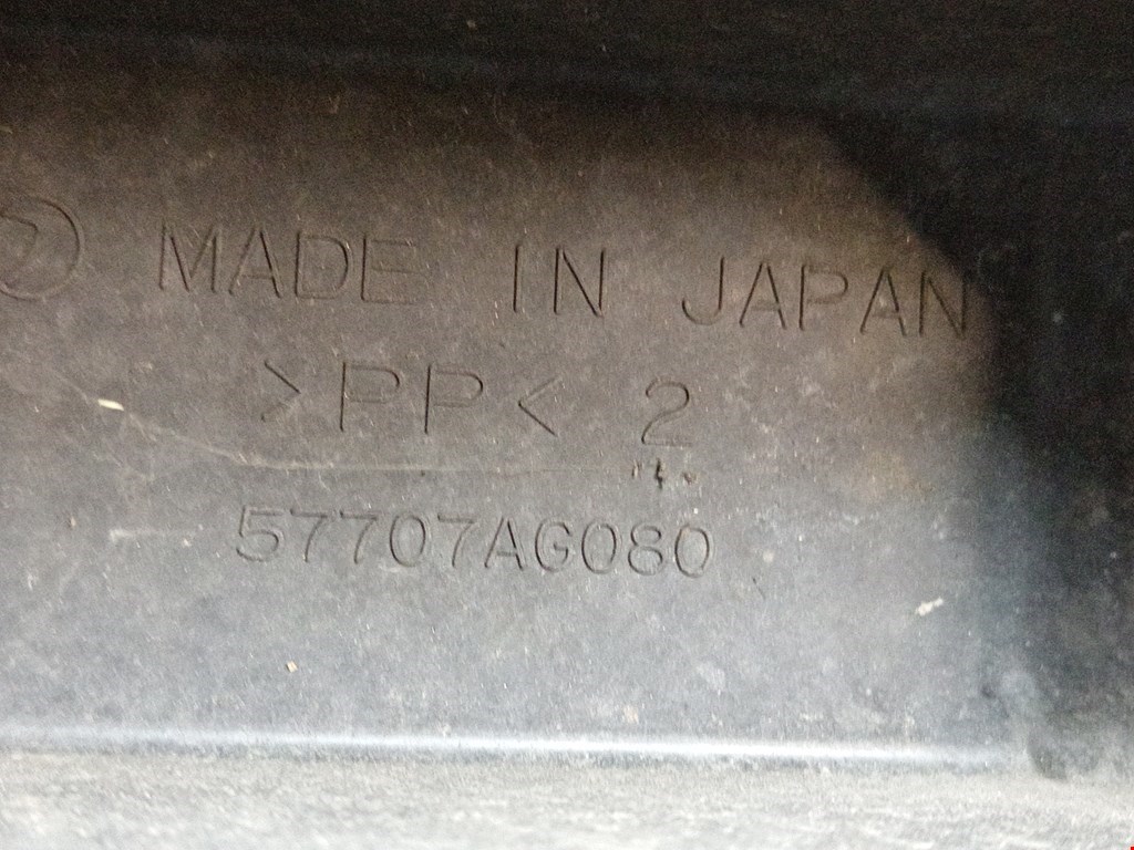 Кронштейн переднего бампера центральный SUBARU Outback 2003-2009