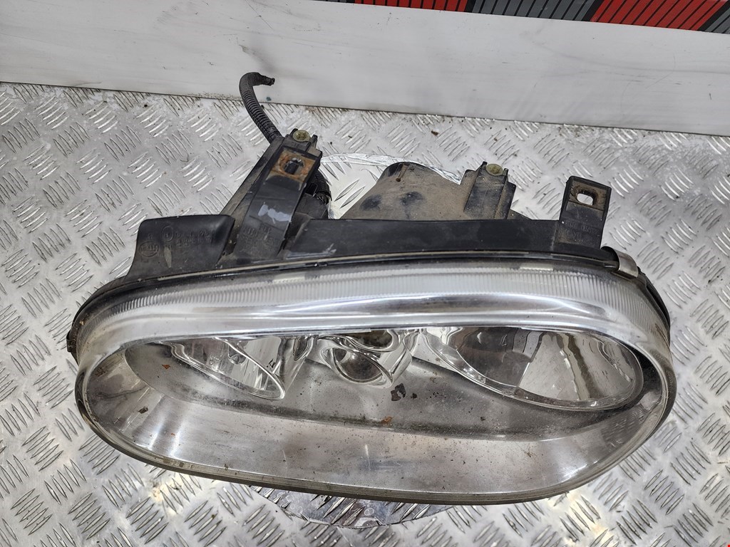 Фара левая VOLKSWAGEN Golf IV 1997-2003