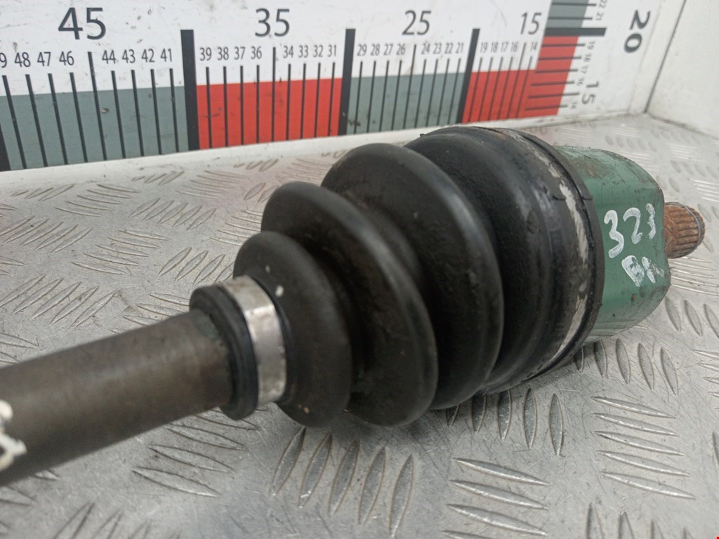 Полуось (привод, приводной вал) передняя левая MAZDA 323 BA 1994-1998