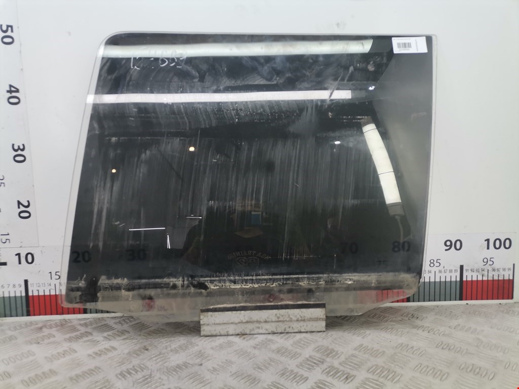 Стекло двери заднее левое OPEL Kadett E 1984-1994