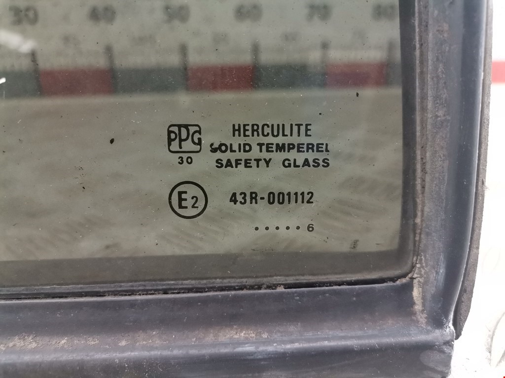 Стекло двери заднее левое OPEL Kadett E 1984-1994