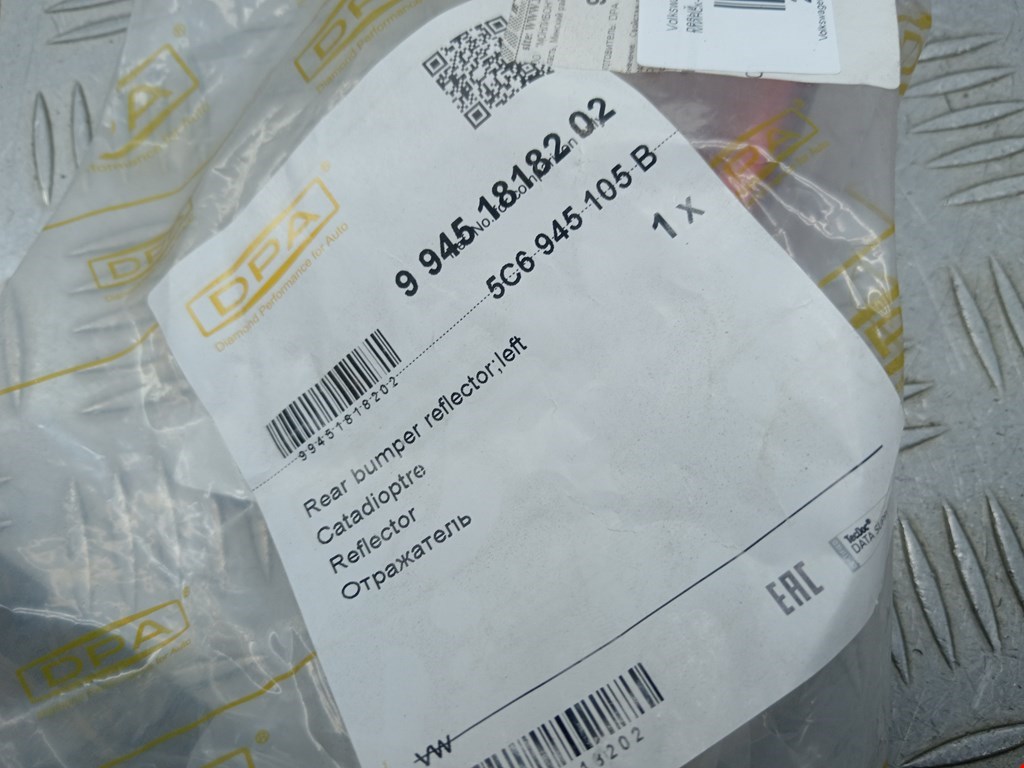 Отражатель в бампер задний левый VOLKSWAGEN Jetta VI 2011-2017