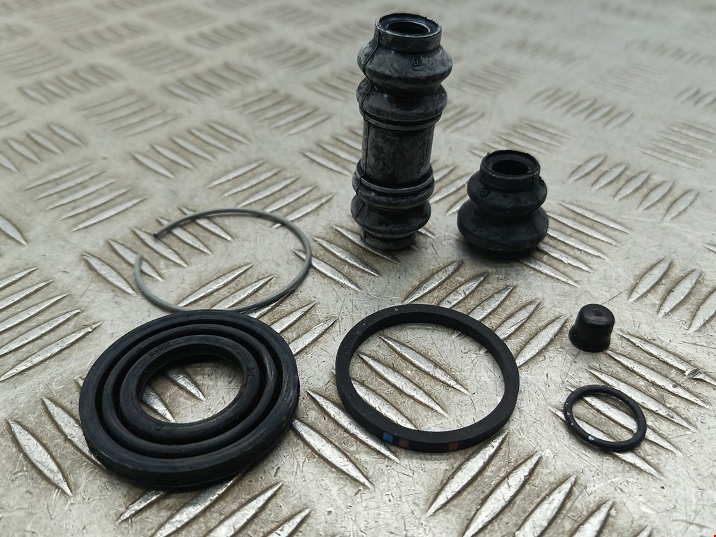 Ремкомплект суппорта Mitsubishi Colt 3 (1988-1992)